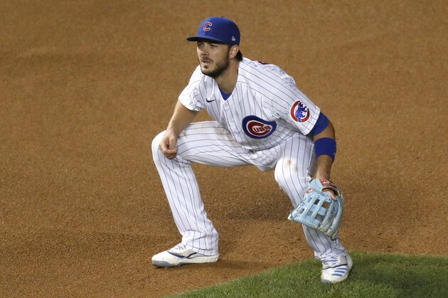 Chicago Cubs third baseman Kris Bryant fields his position during a baseball game Tuesday, Aug. 4, 2020, in Chicago. (AP Photo/Charles Rex Arbogast)