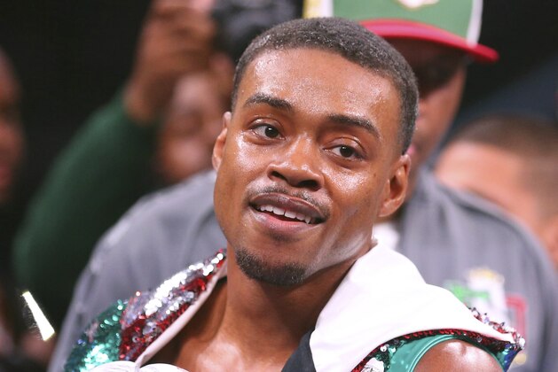 Errol Spence Jr. gestures for the TV cameras before an IBF World Welterweight Championship boxing bout against Mikey Garcia Saturday, March 16, 2019, in Arlington, Texas. (AP Photo/Richard W. Rodriguez)