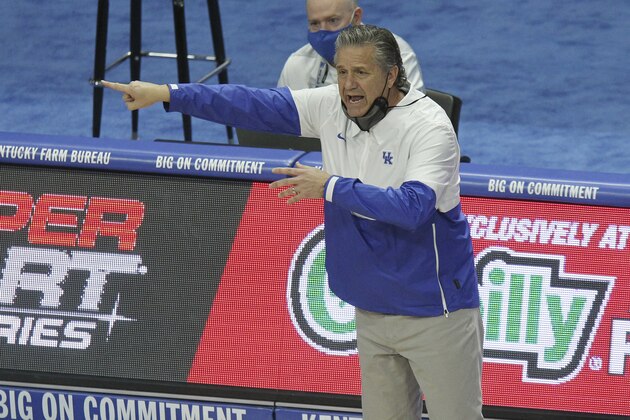 Kentucky head coach John Calipari directs his team during the first half of an NCAA college basketball game against Richmond in Lexington, Ky., Sunday, Nov. 29, 2020. (AP Photo/James Crisp)