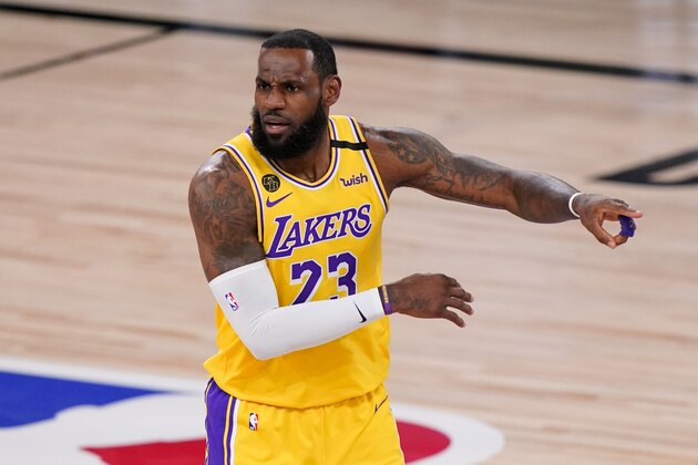 Los Angeles Lakers forward LeBron James reacts during the first half in Game 4 of basketball's NBA Finals against the Miami Heat Tuesday, Oct. 6, 2020, in Lake Buena Vista, Fla. (AP Photo/Mark J. Terrill)