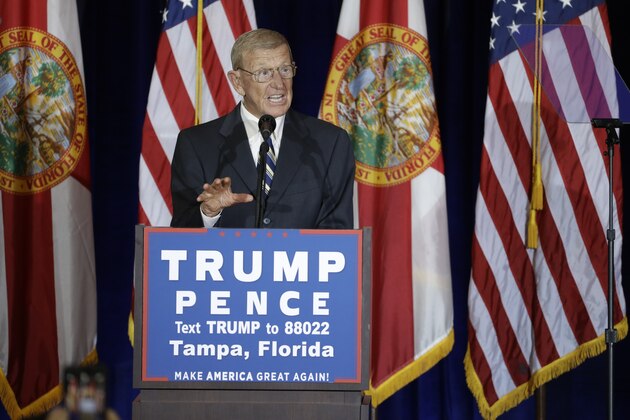 Former football coach Lou Holtz before a speech by Republican presidential candidate Donald Trump Saturday, Nov. 5, 2016, in Tampa, Fla. (AP Photo/Chris O'Meara)