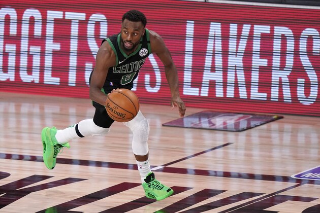 Boston Celtics' Kemba Walker plays against the Miami Heat during the second half of an NBA conference final playoff basketball game Friday, Sept. 25, 2020, in Lake Buena Vista, Fla. (AP Photo/Mark J. Terrill)