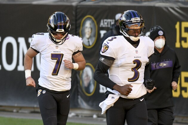 Baltimore Ravens quarterbacks Robert Griffin III (3) and Trace McSorley come out to warm up before an NFL football game against the Pittsburgh Steelers, Wednesday, Dec. 2, 2020, in Pittsburgh. (AP Photo/Don Wright)