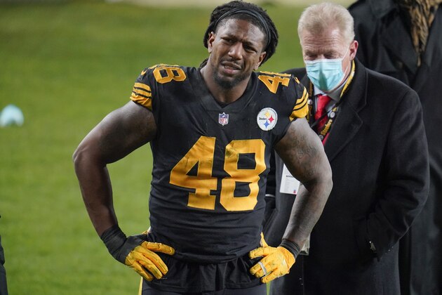 Pittsburgh Steelers outside linebacker Bud Dupree grimaces as walks on the sideline after being injured playing against the Baltimore Ravens during an NFL football game Wednesday, Dec. 2, 2020, in Pittsburgh. The Steelers won 19-14. (AP Photo/Gene J. Puskar)