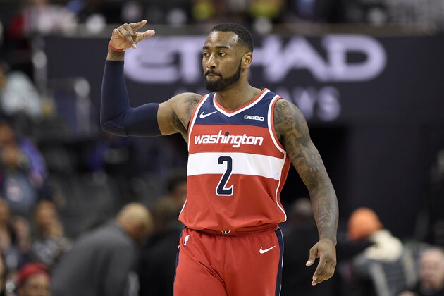 Washington Wizards guard John Wall gestures after hitting a 3-point basket during the second half of the team's NBA basketball game against the Brooklyn Nets, Saturday, Dec. 1, 2018, in Washington. The Wizards won 102-88. (AP Photo/Nick Wass) Washington Wizards guard John Wall gestures after hitting a 3-point basket during the second half of the team's NBA basketball game against the Brooklyn Nets, Saturday, Dec. 1, 2018, in Washington. The Wizards won 102-88. (AP Photo/Nick Wass)