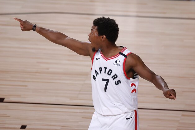 Toronto Raptors' Kyle Lowry reacts after hitting a 3-pointer against the Brooklyn Nets during the first quarter in Game 1 of an NBA basketball first-round playoff series, Monday, Aug. 17, 2020, in Lake Buena Vista, Fla. (Kevin C. Cox/Pool Photo via AP)