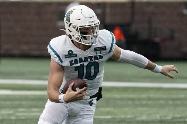 Coastal Carolina's Grayson McCall (10) runs against Texas State during the first half of an NCAA college football game in San Marcos, Texas, Saturday, Nov. 28, 2020. (AP Photo/Chuck Burton)