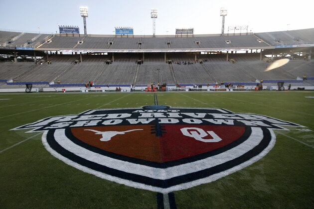 The Red River Showdown logo is shown on the field of the Cotton Bowl, prior to an NCAA college football game between the University of Texas and Oklahoma, in Dallas,  Saturday, Oct. 10, 2020. (AP Photo/Michael Ainsworth)