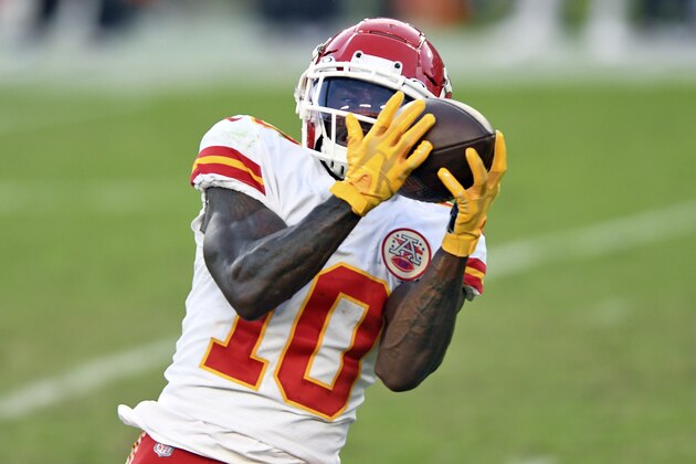 Kansas City Chiefs wide receiver Tyreek Hill (10) pulls in a 44-yard touchdown reception from quarterback Patrick Mahomes during the first half of an NFL football game against the Tampa Bay Buccaneers Sunday, Nov. 29, 2020, in Tampa, Fla. (AP Photo/Jason Behnken) Kansas City Chiefs wide receiver Tyreek Hill (10) pulls in a 44-yard touchdown reception from quarterback Patrick Mahomes during the first half of an NFL football game against the Tampa Bay Buccaneers Sunday, Nov. 29, 2020, in Tampa, Fla. (AP Photo/Jason Behnken)