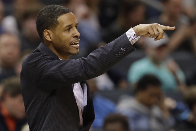 Charlotte Hornets associate head coach Stephen Silas directs his team against the Utah Jazz during the first half of an NBA basketball game in Charlotte, N.C., Friday, Jan. 12, 2018. (AP Photo/Chuck Burton)