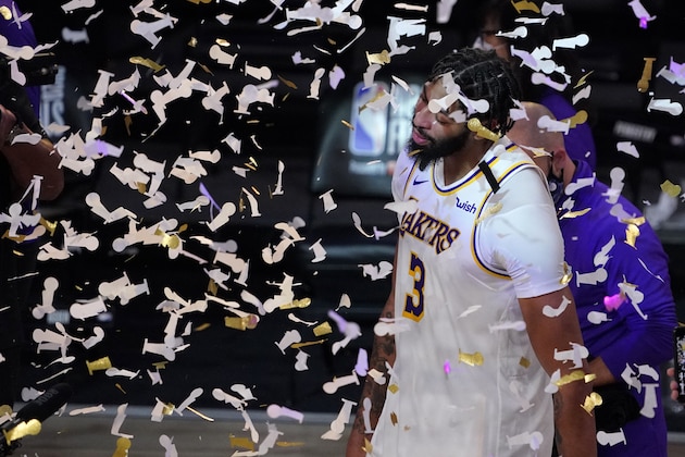 Los Angeles Lakers' Anthony Davis (3) celebrates after the Lakers defeated the Miami Heat 106-93 in Game 6 of basketball's NBA Finals Sunday, Oct. 11, 2020, in Lake Buena Vista, Fla. (AP Photo/Mark J. Terrill)