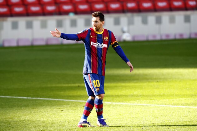 Barcelona's Lionel Messi gestures during the Spanish La Liga soccer match between FC Barcelona and Osasuna at the Camp Nou stadium in Barcelona, Spain, Sunday, Nov. 29, 2020. (AP Photo/Joan Monfort) Barcelona's Lionel Messi gestures during the Spanish La Liga soccer match between FC Barcelona and Osasuna at the Camp Nou stadium in Barcelona, Spain, Sunday, Nov. 29, 2020. (AP Photo/Joan Monfort)