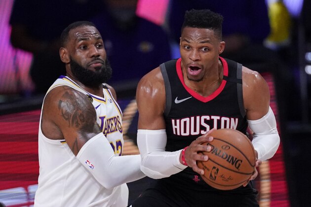 Houston Rockets Russell Westbrook, right, grabs a rebound next to Los Angeles Lakers' LeBron James during the second half of an NBA conference semifinal playoff basketball game Saturday, Sept. 12, 2020, in Lake Buena Vista, Fla. (AP Photo/Mark J. Terrill) Houston Rockets Russell Westbrook, right, grabs a rebound next to Los Angeles Lakers' LeBron James during the second half of an NBA conference semifinal playoff basketball game Saturday, Sept. 12, 2020, in Lake Buena Vista, Fla. (AP Photo/Mark J. Terrill)
