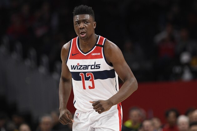 Washington Wizards center Thomas Bryant (13) runs on the court during the first half of an NBA basketball game against the Charlotte Hornets, Thursday, Jan. 30, 2020, in Washington. (AP Photo/Nick Wass)