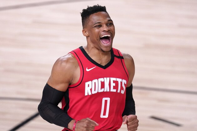 Houston Rockets' Russell Westbrook yells as he runs onto the court before an NBA conference semifinal playoff basketball game against the Los Angeles Lakers Thursday, Sept. 10, 2020, in Lake Buena Vista, Fla. (AP Photo/Mark J. Terrill)