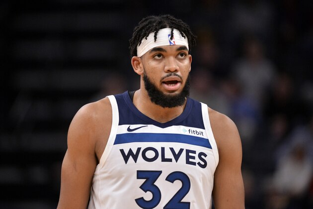 Minnesota Timberwolves center Karl-Anthony Towns (32) plays in the first half of an NBA basketball game against the Memphis Grizzlies Wednesday, Nov. 6, 2019, in Memphis, Tenn. (AP Photo/Brandon Dill)