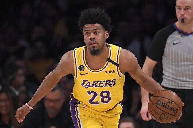 Los Angeles Lakers guard Quinn Cook dribbles during the second half of an NBA basketball game against the San Antonio Spurs Wednesday, Feb. 5, 2020, in Los Angeles. The Lakers won 129-102. (AP Photo/Mark J. Terrill)