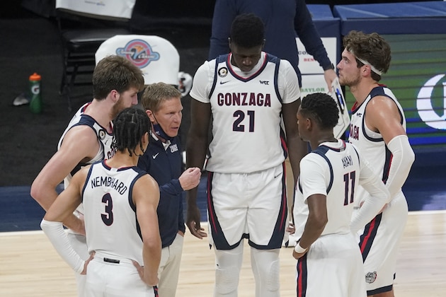 Gonzaga coach Mark Few talks with the team during a timeout in the first half of an NCAA college basketball game against West Virginia, Wednesday, Dec. 2, 2020, in Indianapolis. (AP Photo/Darron Cummings)