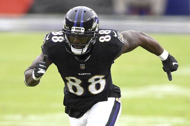 Baltimore Ravens wide receiver Dez Bryant runs a route against the Tennessee Titans during the second half of an NFL football game, Sunday, Nov. 22, 2020, in Baltimore. (AP Photo/Nick Wass)