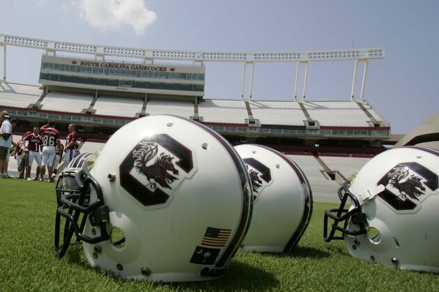 Helmets are placed on the field during Media Day for the South Carolina football team Friday, Aug. 4, 2006, at Williams-Brice Stadium in Columbia, S.C. Steve Spurrier is preparing to start his second fall with the Gamecocks, building on their midseason run of success and hopeful to avoid another clunker at the end like his team did a year ago.  (AP Photo/Mary Ann Chastain)