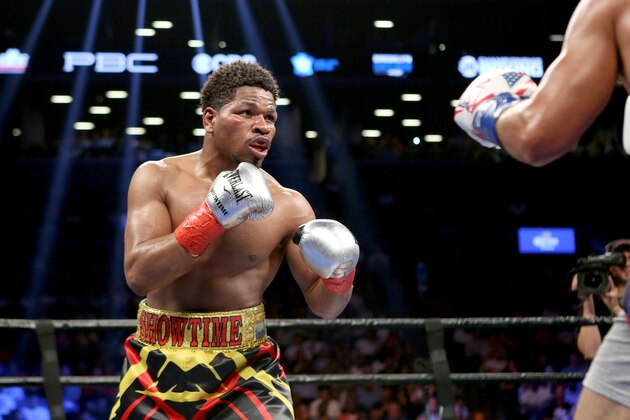 Shawn Porter in action against Keith Thurman during their WBA Welterweight title fight at the Barclays Center in Brooklyn, on Saturday, June 25, 2016. Thurman won via decision. (AP Photo/Gregory Payan)