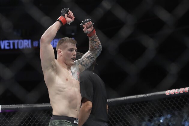 Marvin Vettori reacts after defeating Cezar Ferreira during a middleweight mixed martial arts fight at UFC Fight Night in Sacramento, Calif., Saturday, July 13, 2019. (AP Photo/Jeff Chiu)