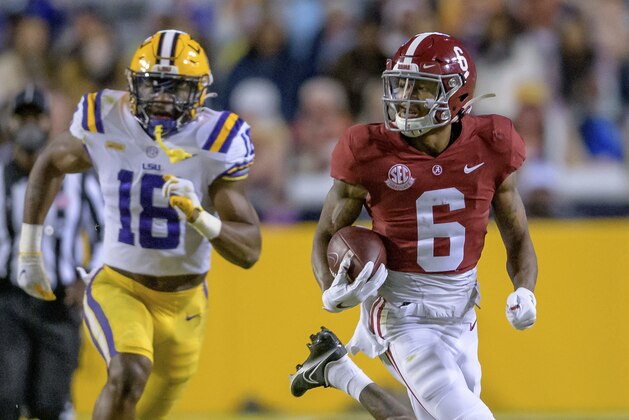 Alabama wide receiver DeVonta Smith (6) runs for gain during an NCAA college football game against LSU in Baton Rouge, La., Saturday, Dec. 5, 2020. (AP Photo/Matthew Hinton) Alabama wide receiver DeVonta Smith (6) runs for gain during an NCAA college football game against LSU in Baton Rouge, La., Saturday, Dec. 5, 2020. (AP Photo/Matthew Hinton)