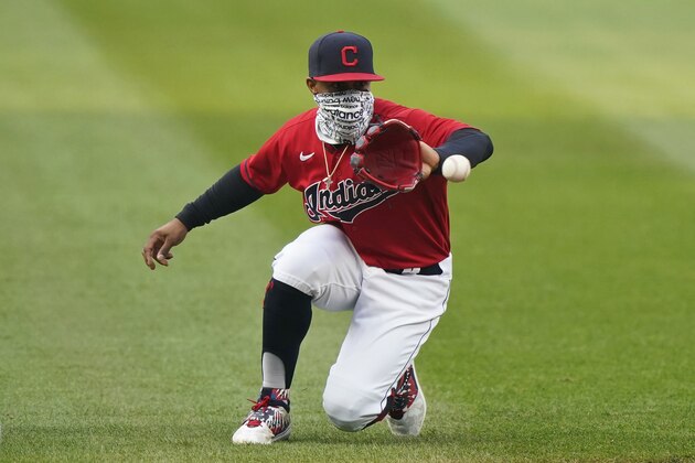 Cleveland Indians' Francisco Lindor fields a ball hit by Chicago White Sox's Eloy Jimenez in the first inning of a baseball game, Wednesday, Sept. 23, 2020, in Cleveland. Jimenez grounded into a force out. (AP Photo/Tony Dejak)