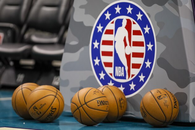 Basketballs sit at the ready next to a pad for the basket during the warm-ups of an NBA basketball game between the Boston Celtics and Charlotte Hornets in Charlotte, N.C., Thursday, Nov. 7, 2019. The Celtics won 108-87. (AP Photo/Bob Leverone) Basketballs sit at the ready next to a pad for the basket during the warm-ups of an NBA basketball game between the Boston Celtics and Charlotte Hornets in Charlotte, N.C., Thursday, Nov. 7, 2019. The Celtics won 108-87. (AP Photo/Bob Leverone)