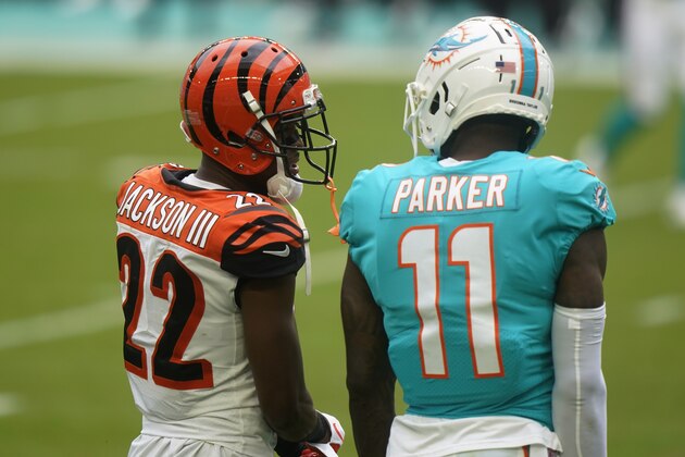 Cincinnati Bengals cornerback William Jackson (22) talks to Miami Dolphins wide receiver DeVante Parker (11) during the first half of an NFL football game, Sunday, Dec. 6, 2020, in Miami Gardens, Fla. (AP Photo/Wilfredo Lee) Cincinnati Bengals cornerback William Jackson (22) talks to Miami Dolphins wide receiver DeVante Parker (11) during the first half of an NFL football game, Sunday, Dec. 6, 2020, in Miami Gardens, Fla. (AP Photo/Wilfredo Lee)