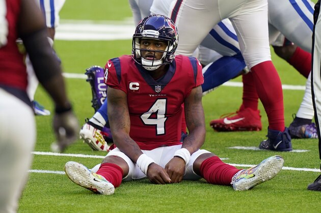 Houston Texans quarterback Deshaun Watson (4) sits on the turf after losing a fumble to the Indianapolis Colts during the second half of an NFL football game Sunday, Dec. 6, 2020, in Houston. (AP Photo/David J. Phillip)