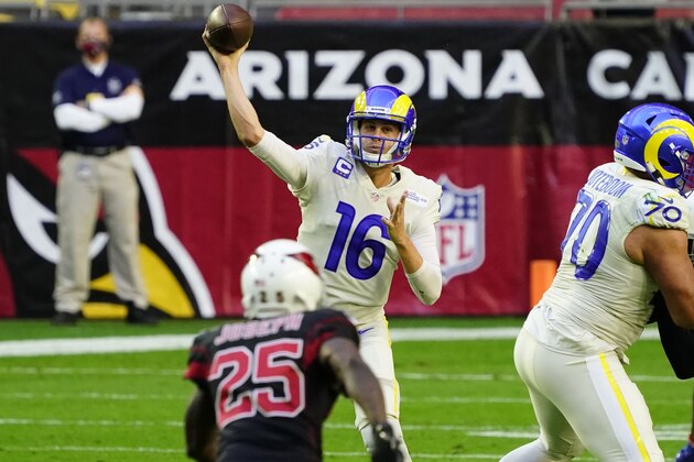 Los Angeles Rams quarterback Jared Goff (16) throws as Arizona Cardinals cornerback Johnathan Joseph (25) looks on during the first half of an NFL football game, Sunday, Dec. 6, 2020, in Glendale, Ariz. (AP Photo/Rick Scuteri)