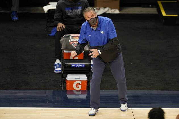 Kentucky head coach John Calipari in action during the first half of an NCAA college basketball game against Kansas, Tuesday, Dec. 1, 2020, in Indianapolis. (AP Photo/Darron Cummings)
