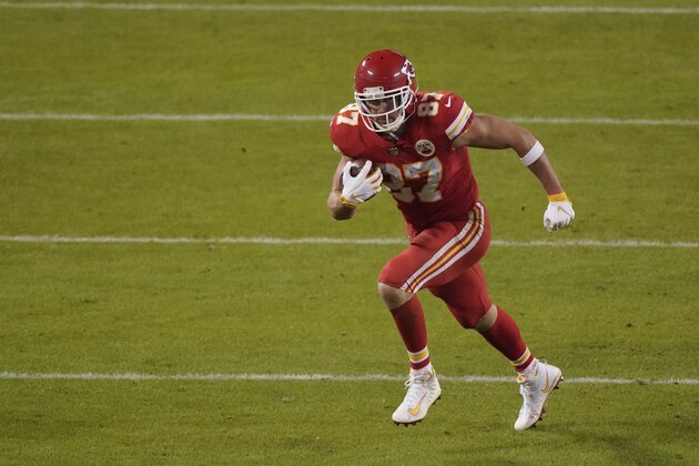 Kansas City Chiefs tight end Travis Kelce (87) runs in the second half of an NFL football game against the Denver Broncos in Kansas City, Mo., Sunday, Dec. 6, 2020. (AP Photo/Charlie Riedel)