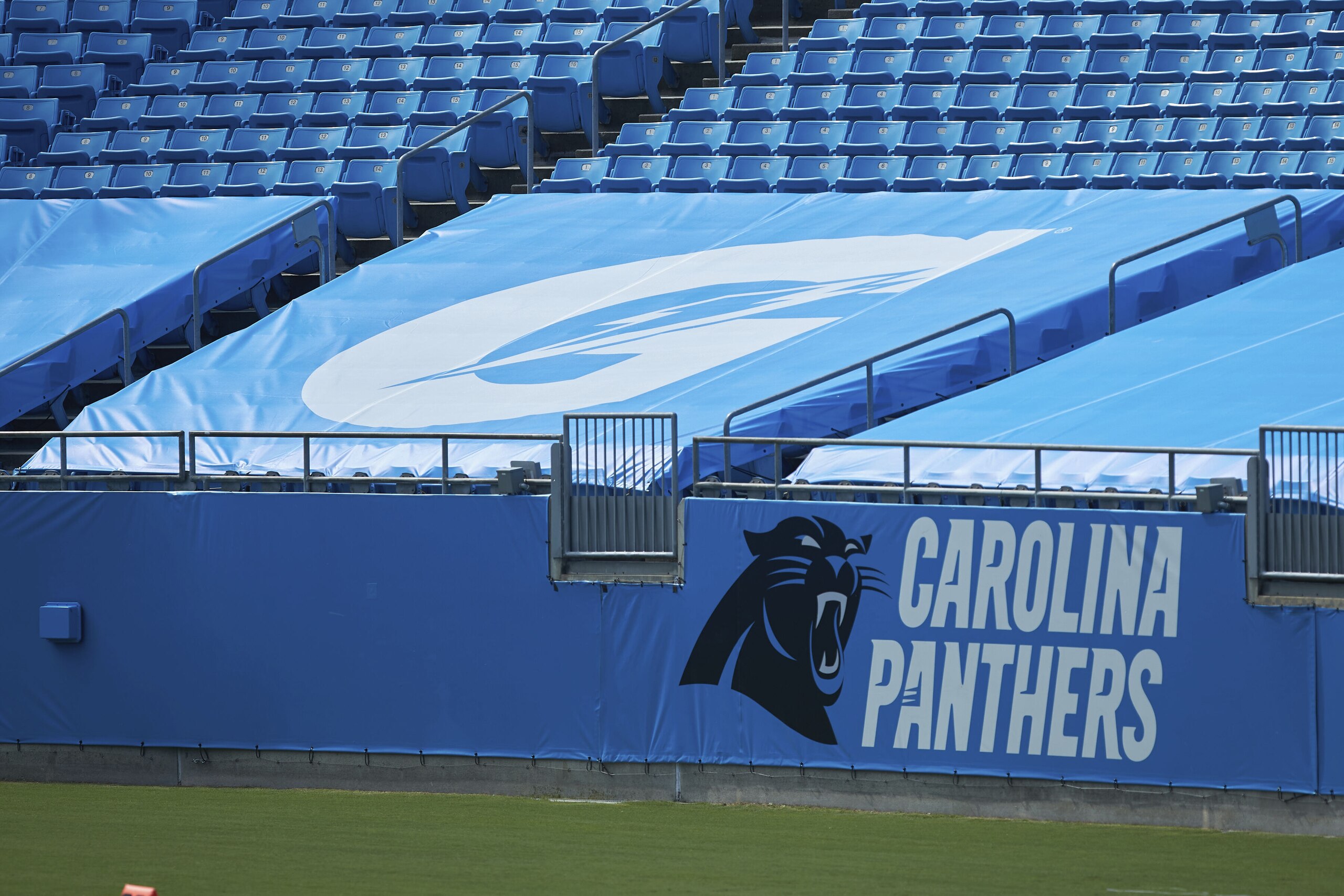 A Gatorade logo is displayed on a tarp covering seats in the lower bowl of Bank of America Stadium prior to the NFL football game between the Las Vegas Raiders and the Carolina Panthers, Sunday, Sept. 13, 2020, in Charlotte, N.C. (AP Photo/Brian Westerholt)