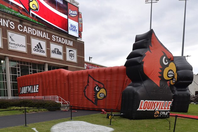 FILE - This is a Sept. 17, 2016, file photo showing signage on Papa John' Cardinal Stadium in Louisville Ky. Papa John's, which has featured founder John Schnatter as the face of the company in logos and TV ads, is pulling his image from its marketing after reports he used a racial slur. The University of Louisville said, Friday, July 14, 2018, it will remove the Papa John's name from its football stadium. (AP Photo/Timothy D. Easley, File) FILE - This is a Sept. 17, 2016, file photo showing signage on Papa John' Cardinal Stadium in Louisville Ky. Papa John's, which has featured founder John Schnatter as the face of the company in logos and TV ads, is pulling his image from its marketing after reports he used a racial slur. The University of Louisville said, Friday, July 14, 2018, it will remove the Papa John's name from its football stadium. (AP Photo/Timothy D. Easley, File)