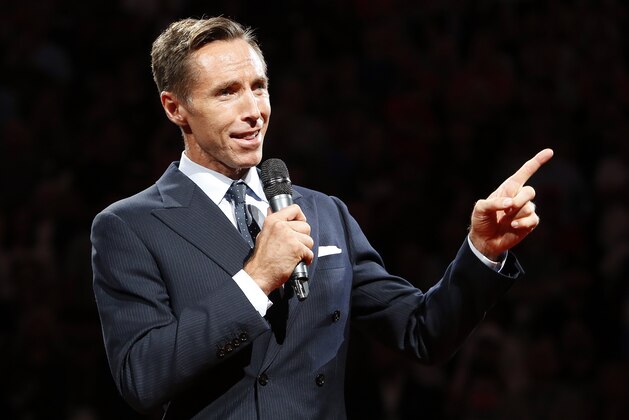 Two-time NBA most valuable player Steve Nash is introduced into the Suns Ring of Fire at halftime of an NBA basketball game between the Phoenix Suns and the Portland Trail Blazers, Friday, Oct. 30, 2015, in Phoenix. (AP Photo/Rick Scuteri)