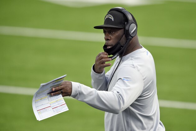Los Angeles Chargers head coach Anthony Lynn gives out instructions from the sideline during the first half of an NFL football game against the New England Patriots Sunday, Dec. 6, 2020, in Inglewood, Calif. (AP Photo/Kelvin Kuo )