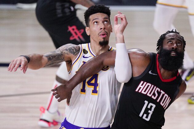 Los Angeles Lakers' Danny Green, left, works for position under the basket against Houston Rockets' James Harden (13) during the second half of an NBA conference semifinal playoff basketball game Saturday, Sept. 12, 2020, in Lake Buena Vista, Fla. (AP Photo/Mark J. Terrill)