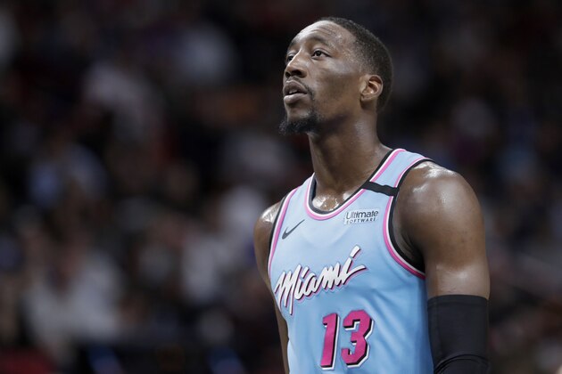 Miami Heat forward Bam Adebayo stand son the court during the first half of an NBA basketball game against the Philadelphia 76ers, Monday, Feb. 3, 2020, in Miami. (AP Photo/Lynne Sladky)