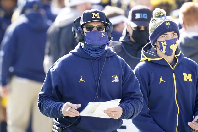 Michigan head coach Jim Harbaugh is seen during the first half of an NCAA college football game, Saturday, Oct. 31, 2020, in Ann Arbor, Mich. (AP Photo/Carlos Osorio)