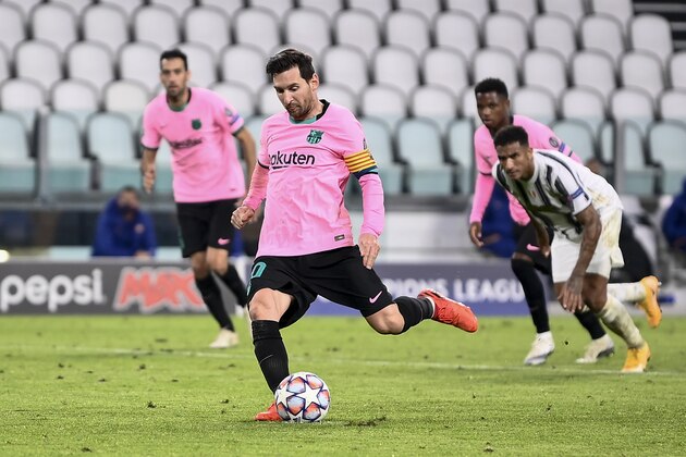 Lionel Messi of FC Barcelona scores a goal on penalty against Juventus F.C. during a group stage soccer match of UEFA Champions League in Turin, Italy, Oct. 28, 2020. (Marco Alpozzi/LaPresse via AP)