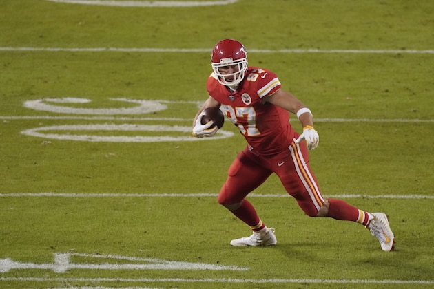 Kansas City Chiefs tight end Travis Kelce (87) runs in the second half of an NFL football game against the Denver Broncos in Kansas City, Mo., Sunday, Dec. 6, 2020. (AP Photo/Charlie Riedel)
