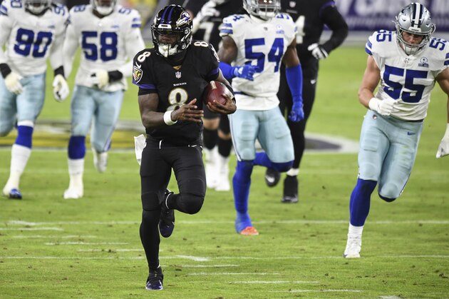 Baltimore Ravens quarterback Lamar Jackson (8) runs the ball for a first half touchdown during an NFL football game against the Dallas Cowboys, Tuesday, Dec. 8, 2020, in Baltimore. (AP Photo/Terrance Williams)