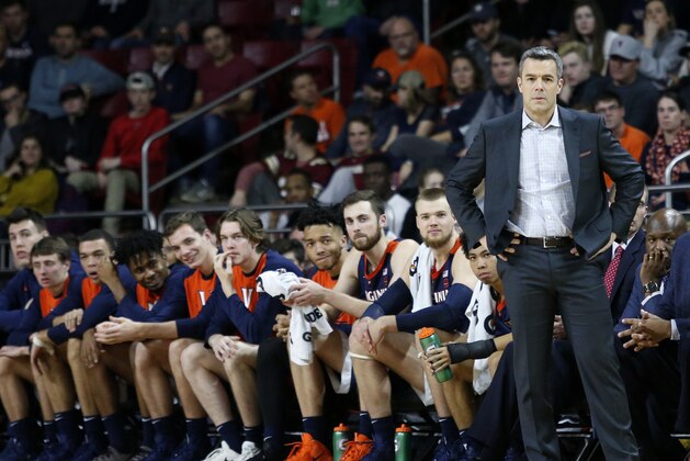 FILE - In this Wednesday, Jan. 9, 2019, file photo, Virginia head coach Tony Bennett stands at the bench during the first half of an NCAA basketball game against Boston College, in Boston. The fourth-ranked Cavaliers face No. 9 Virginia Tech and No. 1 Duke the week of Jan. 14. (AP Photo/Mary Schwalm, File)