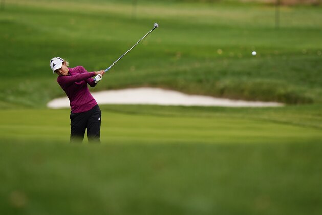 Danielle Kang hits from the 12th fairway during the third round at the KPMG Women's PGA Championship golf tournament at the Aronimink Golf Club, Saturday, Oct. 10, 2020, in Newtown Square, Pa. (AP Photo/Matt Slocum)