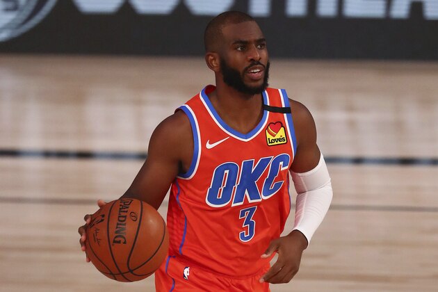 Oklahoma City Thunder guard Chris Paul (3) moves the ball upcourt against the Memphis Grizzlies during the first half of an NBA basketball game Friday, Aug. 7, 2020, in Lake Buena Vista, Fla. (Kim Klement/Pool Photo via AP)