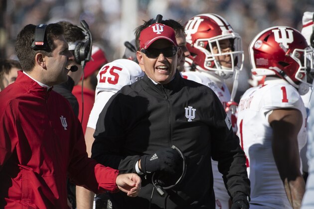 FILE - In this Nov. 16, 2019, file photo, Indiana coach Tom Allen watches the second quarter of the team's NCAA college football game against Penn State in State College, Pa. The Indiana Hoosiers took some big steps in rebranding their football program last season. Now they're looking to build on the momentum. After heir first eight-win season and first winning conference record since 1993 and ending the longest Top 25 drought by a power-five conference school, Indiana starts this season chasing a rare upset of No. 8 Penn State. (AP Photo/Barry Reeger, File)