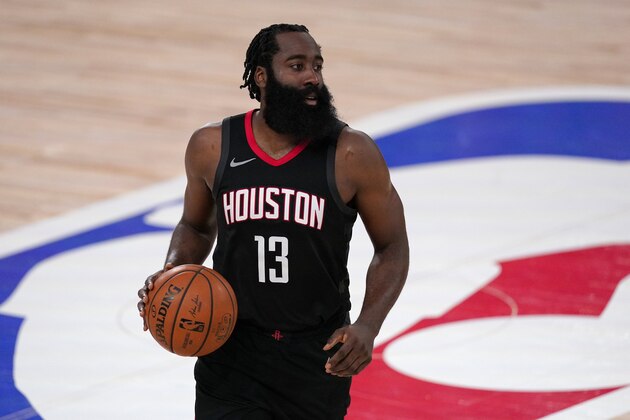 Houston Rockets' James Harden (13) walks the ball up court during the second half of an NBA first-round playoff basketball game against the Oklahoma City Thunder in Lake Buena Vista, Fla., Wednesday, Sept. 2, 2020. (AP Photo/Mark J. Terrill)