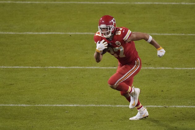 Kansas City Chiefs tight end Travis Kelce (87) runs in the second half of an NFL football game against the Denver Broncos in Kansas City, Mo., Sunday, Dec. 6, 2020. (AP Photo/Charlie Riedel)